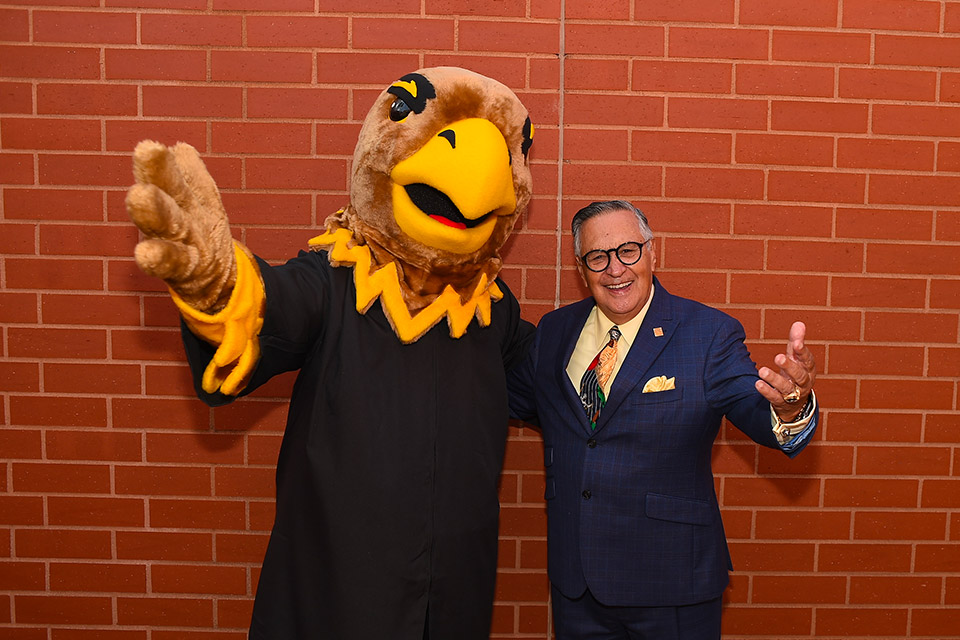 Spanish-language announcer for the Los Angeles Dodgers Jaime Jarrín with Eddie the Golden Eagle, Cal State LA's mascot.