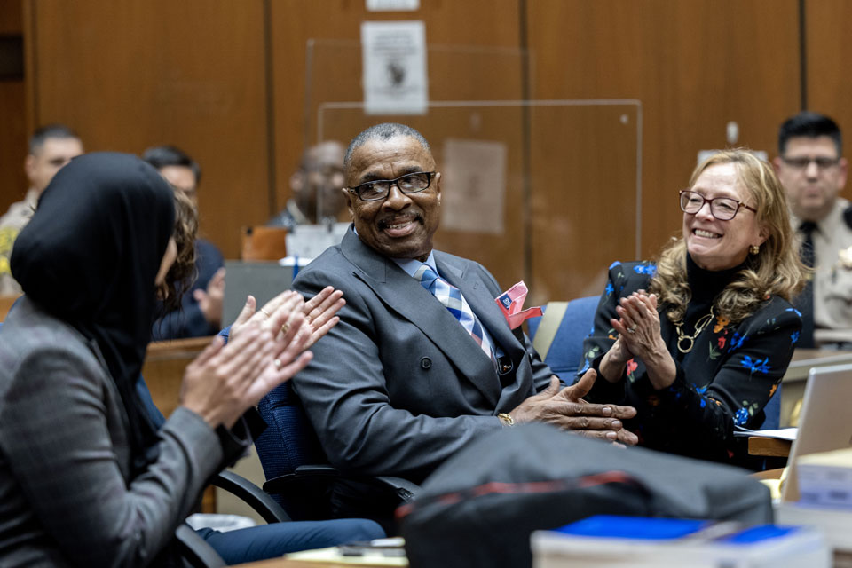 Maurice Hastings smiles as his attorneys from the Los Angeles Innocence Project at Cal State LA