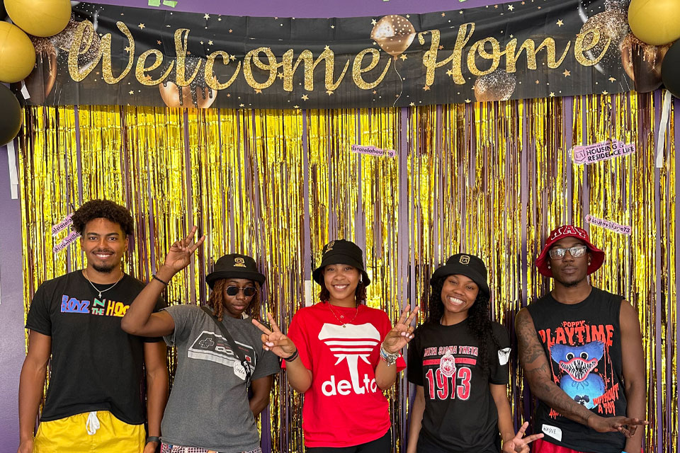 Students celebrate during their move into Cal State LA housing.