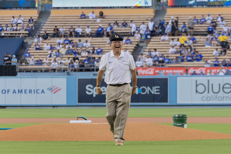 Cal State LA Interim President walking on the pitching mound at Dodger Stadium.