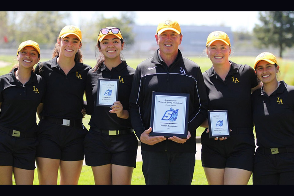 Cal State LA Women's Golf team poses for a group photo.
