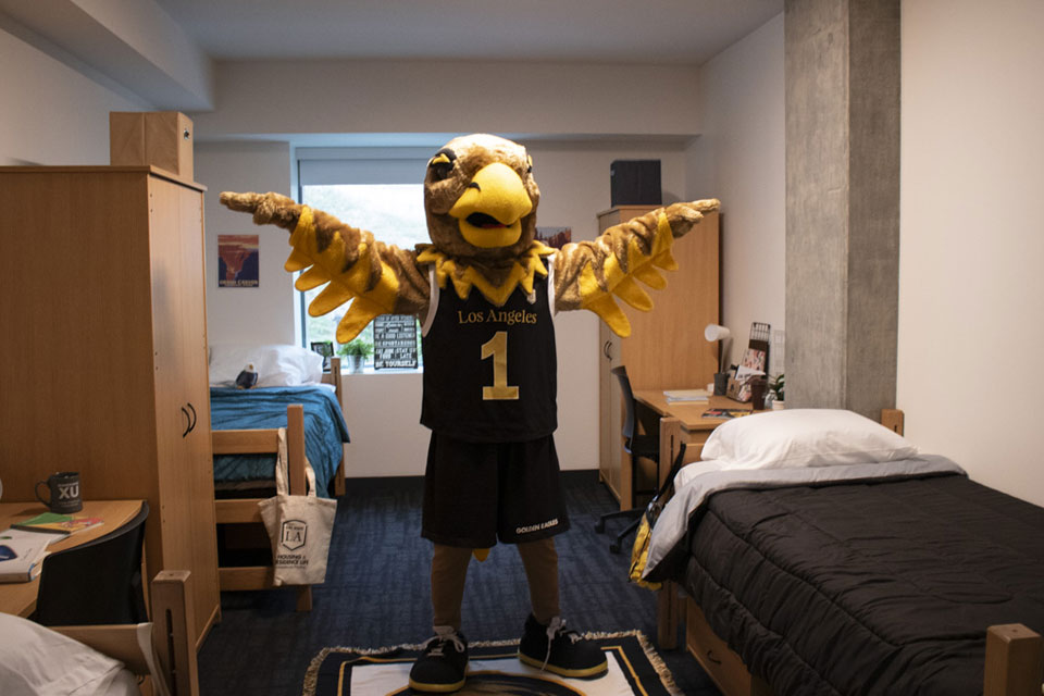 Eddie the Eagle in a dorm room.