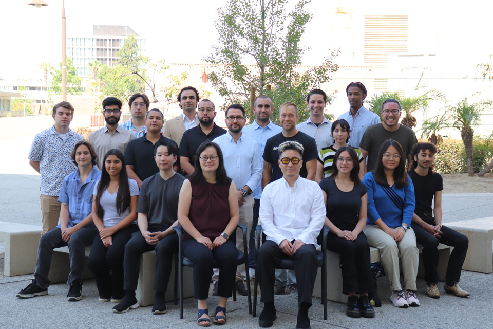 Faculty and students take a group picture together to celebrate their N.S.F. award.