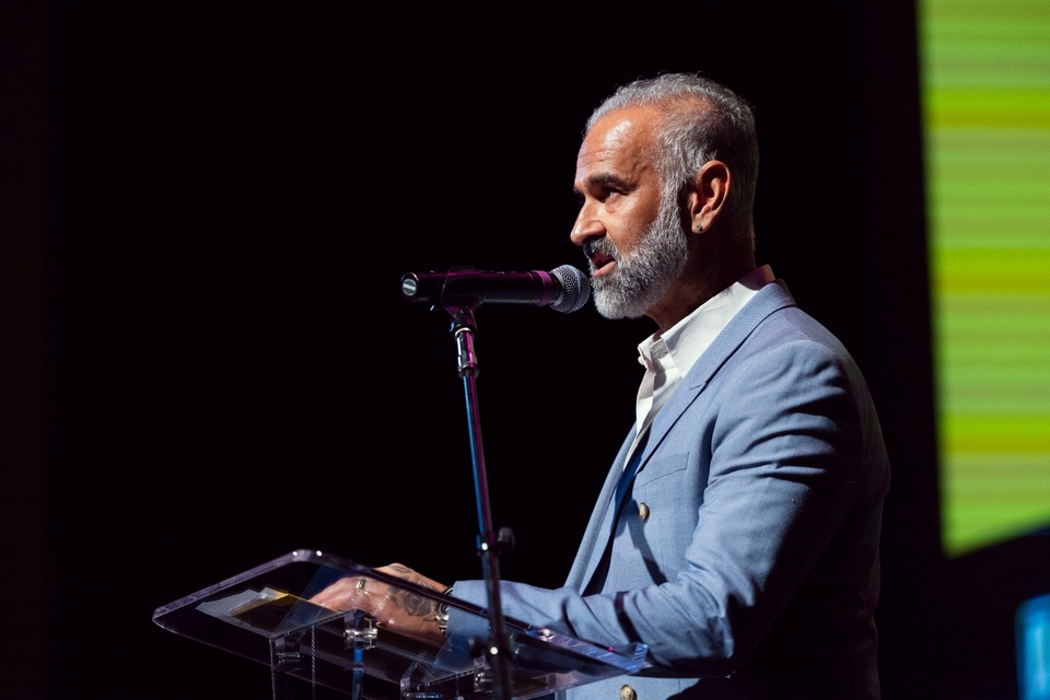 Speaker delivers remarks at a podium during a Cal State LA event.