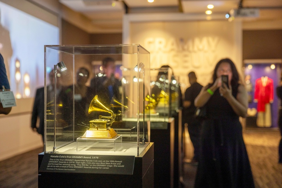 A GRAMMY Award belonging to Natalie Cole is displayed in a glass case at the GRAMMY Museum during a Cal State LA alumni event.
